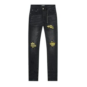 AMIRI Black and Yellow Distressed Jeans